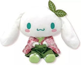 Suppose you miss the beauty of spring and the lovely fragrance of cherry blossoms. Have it forever with the Matcha Sakura Garden Cinnamoroll Kimono Plushie, an enchanting mix of traditional Japanese elegance and kawaii charm. This plushie is made from soft, huggable material, perfect for snuggling or adding a cute touch to your space.
Cinnamoroll's gentle expression and detailed kimono design make his charm as lovely as the spring flower. The vibrant green color and delicate sakura motifs give him a unique